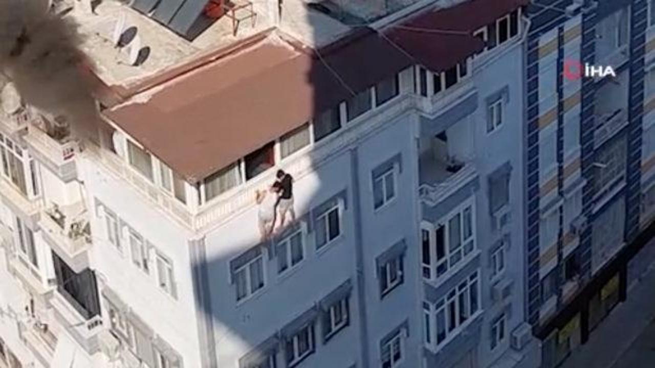 Antalya'da teras katta dehşet: Alevlerden kaçan iki kişi pencereye sarakak canlarını kurtardı
